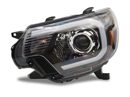 Raxiom 12-15 Toyota Tacoma Axial Projector Headlights w/ SEQL LED Bar- Blk Housing (Clear Lens)