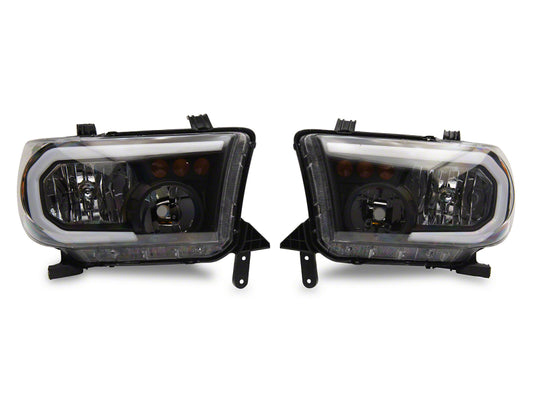 Raxiom 07-13 Toyota Tundra Axial Series Headlights w/ SEQL LED Bar- Blk Housing (Clear Lens)