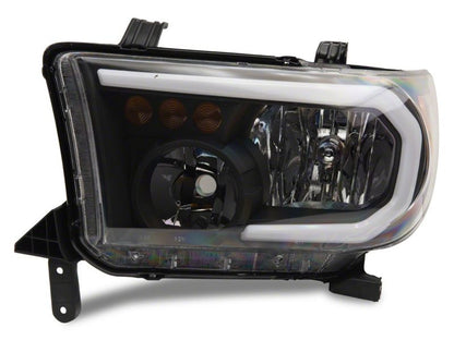 Raxiom 07-13 Toyota Tundra Axial Series Headlights w/ SEQL LED Bar- Blk Housing (Clear Lens)