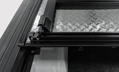 Access LOMAX 2022+ Rivian R1T 4ft 6in Bed (w/ OEM Tonneau Track) Folding Hard Cover - Black Diamond