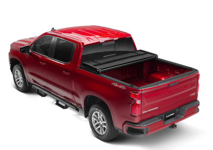 Lund 07-13 Toyota Tundra Fleetside (5.5ft. Bed) Hard Fold Tonneau Cover - Black