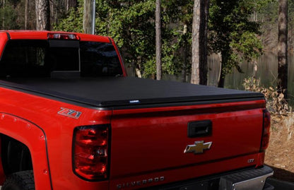 Lund 05-17 Nissan Frontier Styleside (6ft. Bed) Hard Fold Tonneau Cover - Black