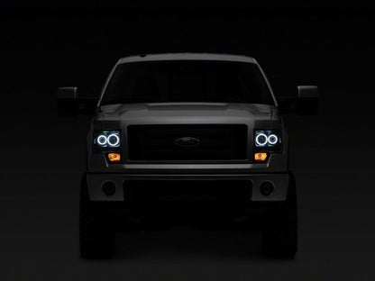 Raxiom 09-14 Ford F-150 Super White LED Halo Projector Headlights- Blk Housing (Clear Lens)