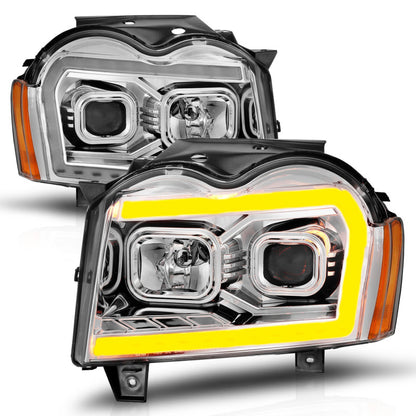 ANZO 05-07 Jeep Grand Cherokee Projector Headlights - w/ Light Bar Switchback Chrome Housing