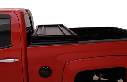 Lund 07-13 Toyota Tundra Fleetside (5.5ft. Bed) Hard Fold Tonneau Cover - Black