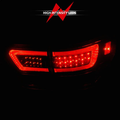 ANZO 11-13 Jeep Grand Cherokee LED Taillights w/ Lightbar Black Housing/Clear Lens 4pcs