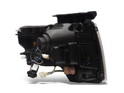Raxiom 09-14 Ford F-150 Axial Series Projector Headlights w/ LED Light Bar- Blk Housing (Clear Lens)
