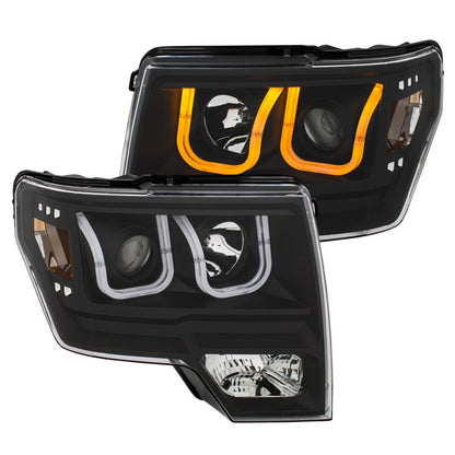 ANZO 2009-2014 Ford F-150 Projector Headlights w/ U-Bar Switchback Black w/ Amber