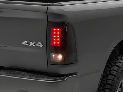 Raxiom 09-18 Dodge RAM 1500/2500/3500 Axial Series LED Tail Lights- BlkHousing- SmokedLens