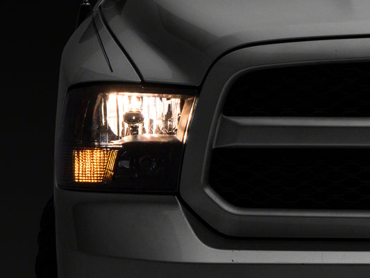 Raxiom 09-18 Dodge RAM 1500 Axial Series Euro Style Headlights w/ Dual Bulb Blk Housing (Clear Lens)